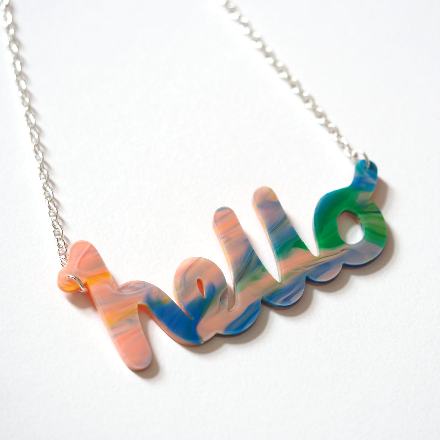 "hello" Necklace in Marble lushness
