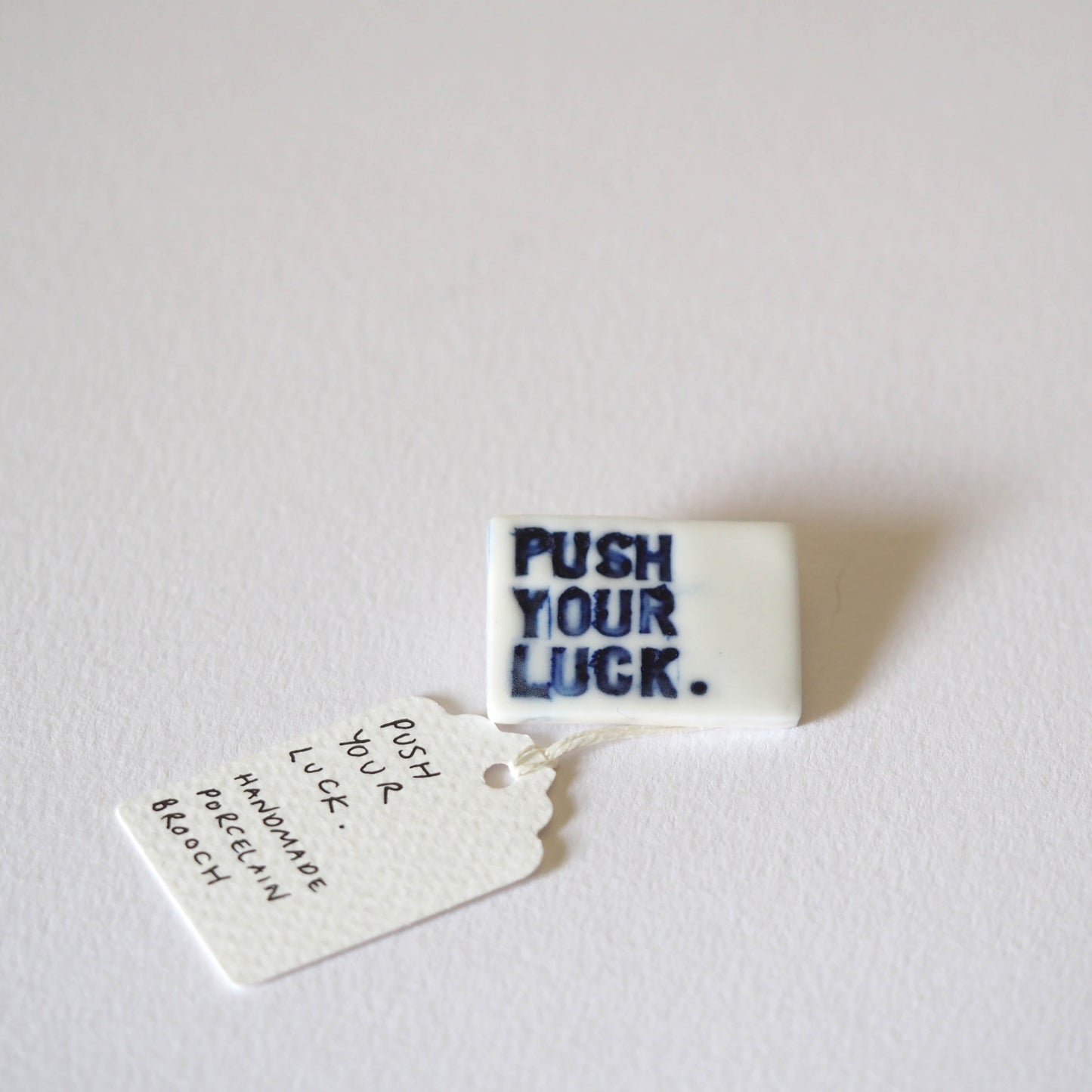 Push Your Luck Porcelain Brooch