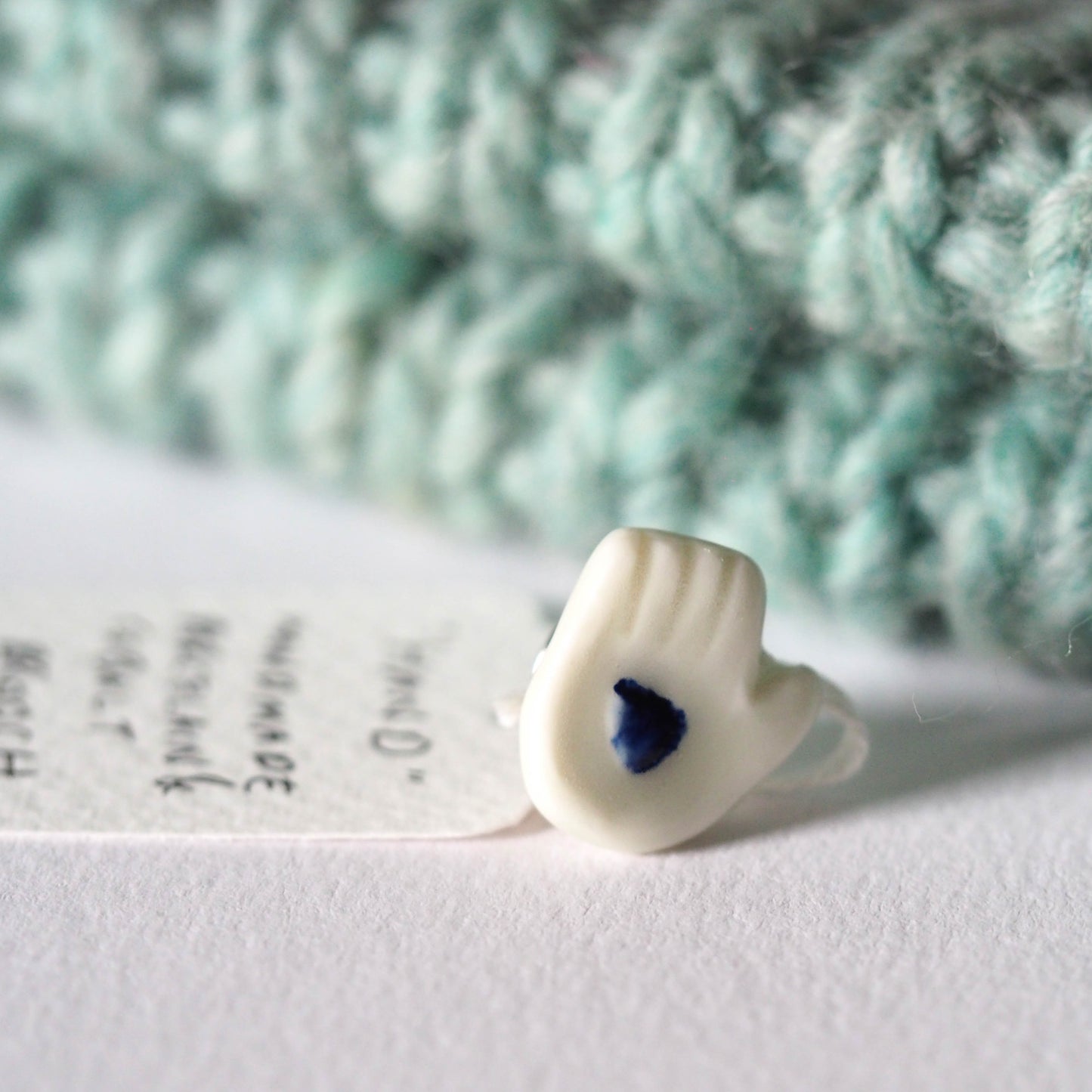 Tiny Porcelain Hand of Generosity Pin-on