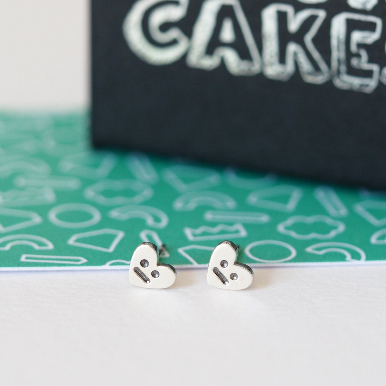 Grumpy Face Heart Studs