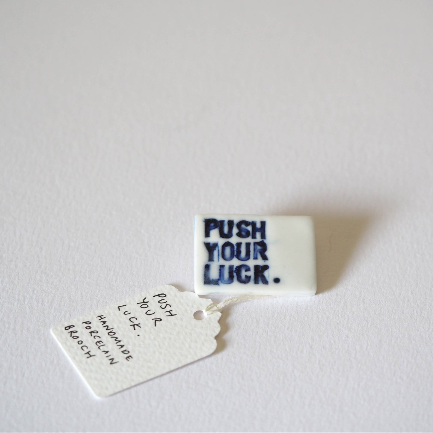 Push Your Luck Porcelain Brooch